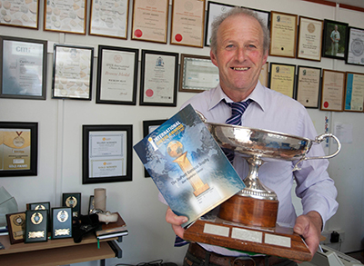 John with Trophy & Awards